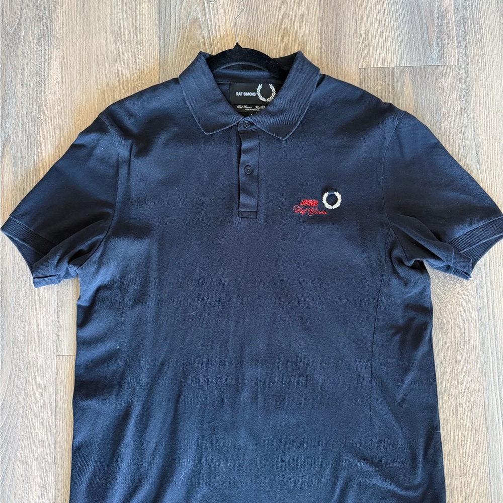 Raf Simons x Fred Perry Dark Blue Polo with Embroidered Crest and Red Script
